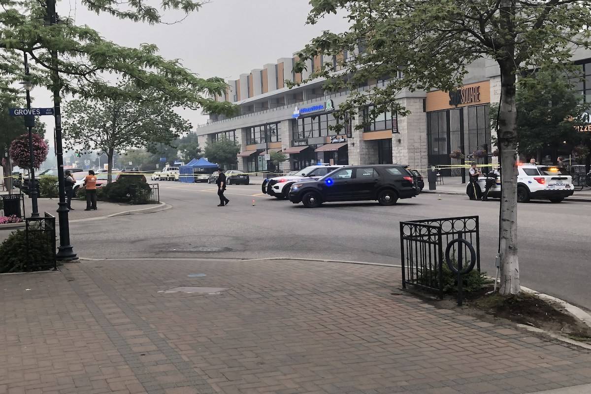 The area between Pandosy Street and KLO Road remains cordoned off as RCMP investigate a suspected targeted shooting that sent two men to the hospital on Saturday, July 31. (Jef Hill/Contributed)