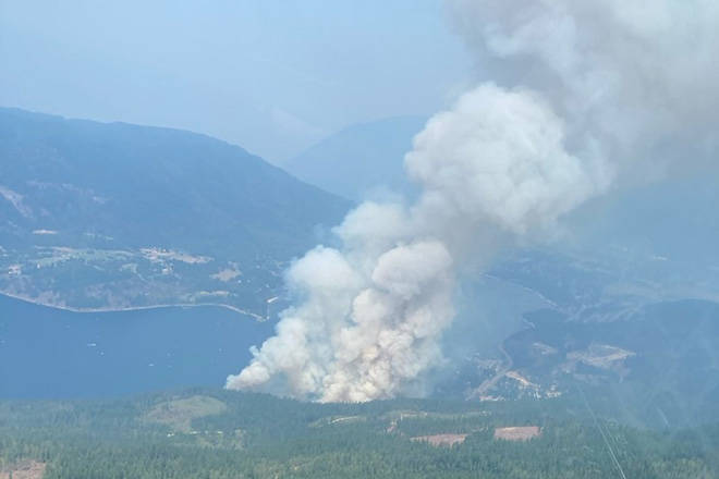 Cooler temperatures and precipitation Sunday, Aug. 1, may have been a help in battling the Two Mile Wildfire near the District of Sicamous. (BC Wildfire Service aerial photo)
Cooler temperatures and precipitation Sunday, Aug. 1, may have been a help in battling the Two Mile Wildfire near the District of Sicamous. (BC Wildfire Service aerial photo)