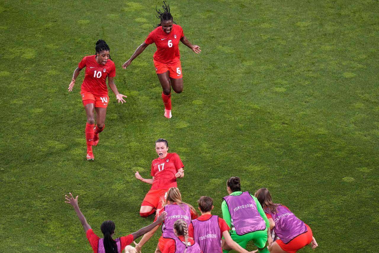 Canada’s Jessie Fleming, 17, celebrates scoring the opening goal from the penalty spot during a women’s semifinal soccer match against United States at the Tokyo Summer Olympic Games, in Kashima, Japan, Monday, Aug. 2, 2021. Fleming scored on a penalty kick in the 74th minute to help the Canadian women’s soccer team to a 1-0 semifinal victory over the United States on Monday at the Tokyo Games. THE CANADIAN PRESS/AP-Martin Mejia