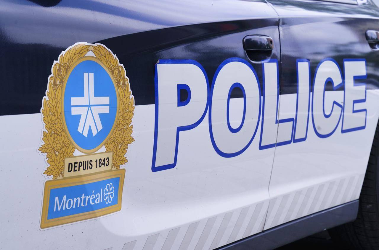 The Montreal Police logo is seen on a police car in Montreal on Wednesday, July 8, 2020.THE CANADIAN PRESS/Paul Chiasson