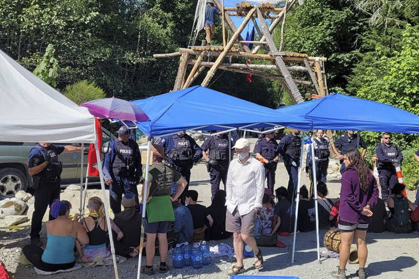 Police square off with protesters during enforcement at the Fairy Creek watershed on the morning of Monday, Aug. 9. (ONE DAY to Save the Old Growth Facebook group)