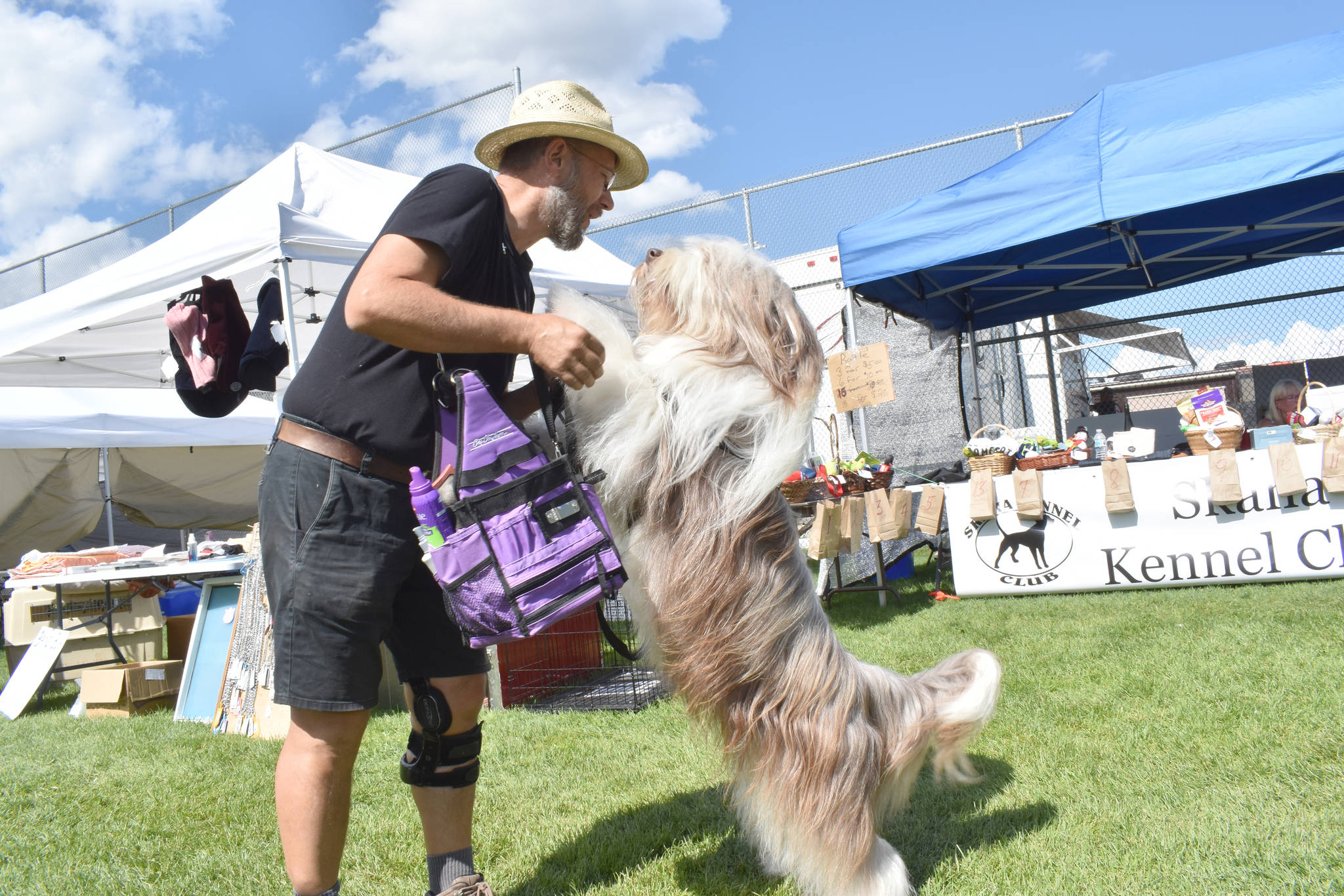 James Young of Naramata and his bearded collie Loki have some fun at the Skaha Kennel Club dog show in Summerland in 2019. The municipality of Summerland has approved a temporary dog park at the Dale Meadows Sports Complex. (Black Press file photo)