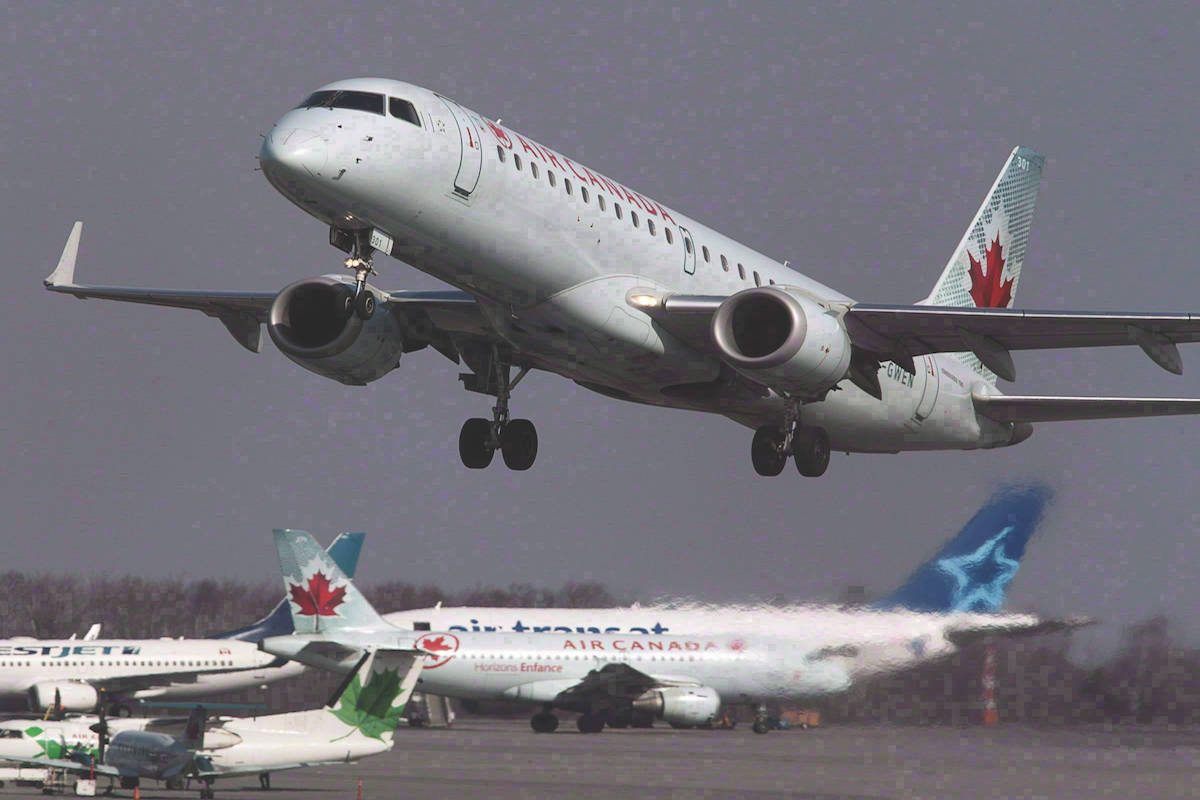 Several flights flying out and into Kelowna International Airport have been delayed, many coming from Vancouver, Calgary or Edmonton. (THE CANADIAN PRESS/Andrew Vaughan)