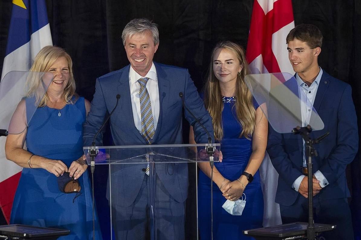 Nova Scotia Progressive Conservative Leader Tim Houston, flanked by his wife, Carol, daughter, Paget, and son, Zachary, left to right, addresses supporters after winning a majority government in the provincial election at the Pictou County Wellness Centre in New Glasgow, N.S., on Tuesday, Aug. 17, 2021. THE CANADIAN PRESS/Andrew Vaughan
