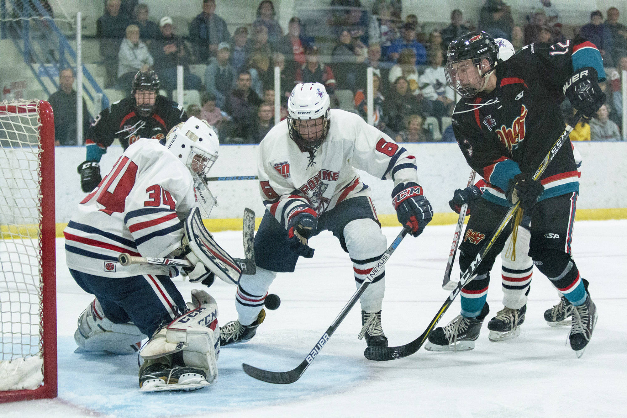 The Spokane Braves (white jerseys) will not participate in the upcoming 2021-22 Kootenay International Junior Hockey League season due to travel uncertainty between Canada and the United States. (File photo)