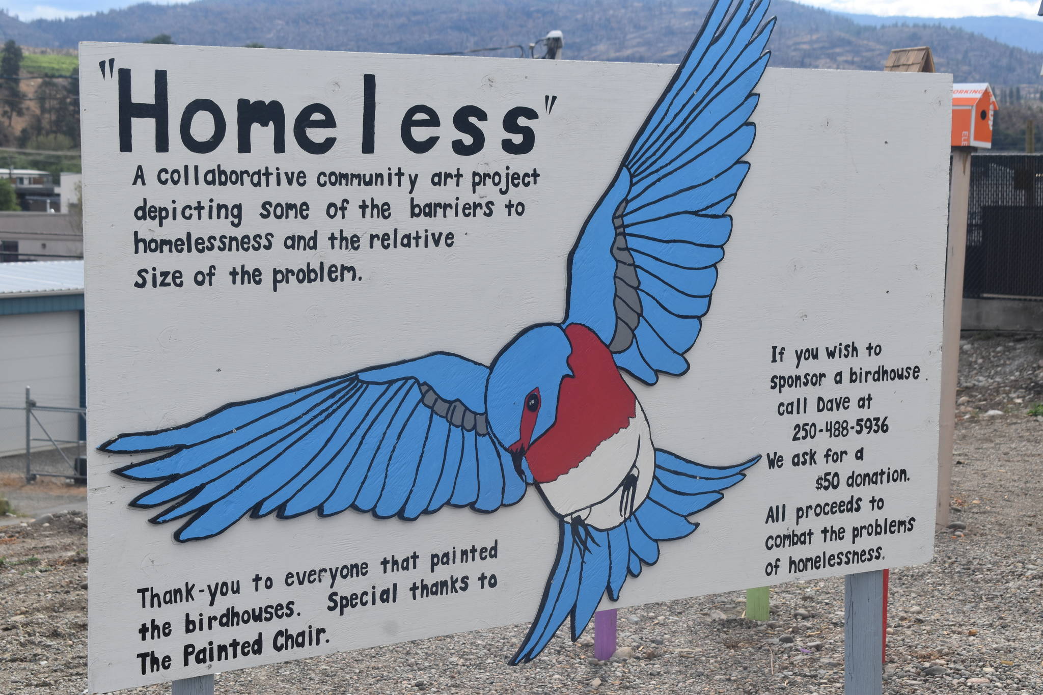 The sign detailing the project with the bird showing the size of the issue (Clayton Whitelaw/Penticton Western News)