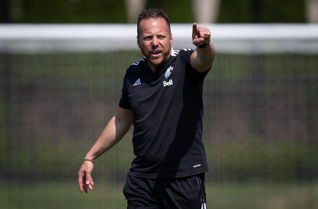 Vancouver Whitecaps head coach Marc Dos Santos gives instructions to players during an MLS soccer club training session, in Vancouver, on Monday, August 2, 2021. THE CANADIAN PRESS/Darryl Dyck