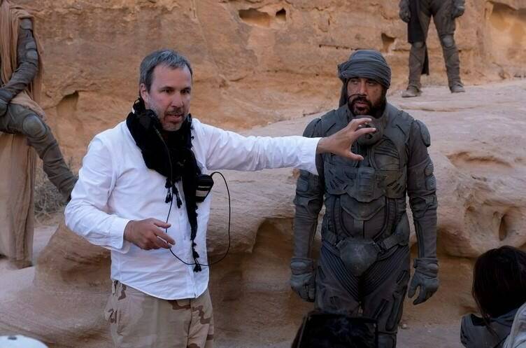 Director Denis Villeneuve and actor Javier Bardem are shown on the set of the Warner Bros. Pictures and Legendary Pictures’ action “Dune,” in a handout photo. The Montreal writer-director has made headlines lately for trumpeting the importance of the cinematic experience and saying he hopes audiences will watch his sci-fi epic “Dune” in theatres. THE CANADIAN PRESS/HO-Warner Bros. Entertainment Inc.-Chiabella James **MANDATORY CREDIT**