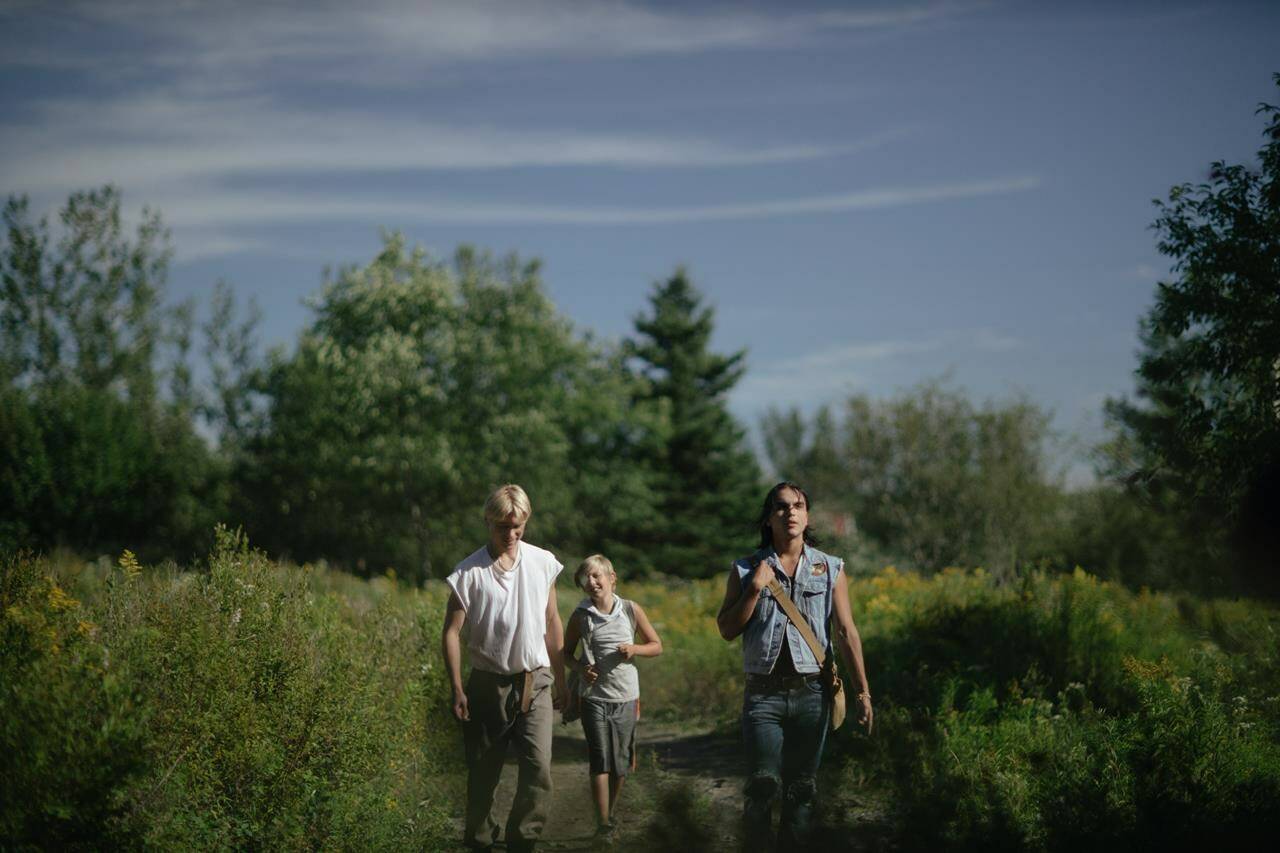 Actors Phillip Lewitski, left to right, Avery Winters-Anthony and Josh Odjick are shown in a scene from the film “Wildhood,” in a handout photo. THE CANADIAN PRESS/HO-Riley Smith **MANDATORY CREDIT**
