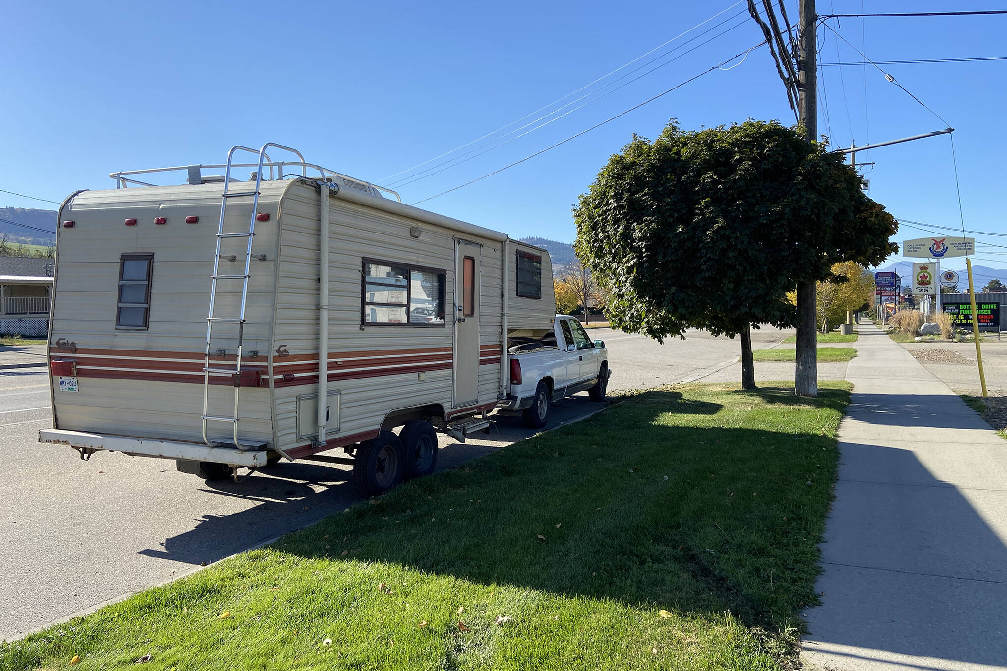 An RV is parked in front of a 25th Avenue business for weeks in the Okanagan Landing area. (Jennifer Smith - Morning Star)