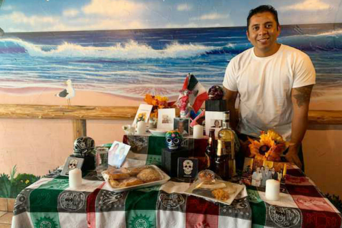 Ivan Gracia Rivera stands in his Cantina Vallarta restaurant in Salmon Arm where there are offerings for Day of the Dead, a tradition he grew up with in Mexico that celebrates and remembers those who have died. (Photo contributed)