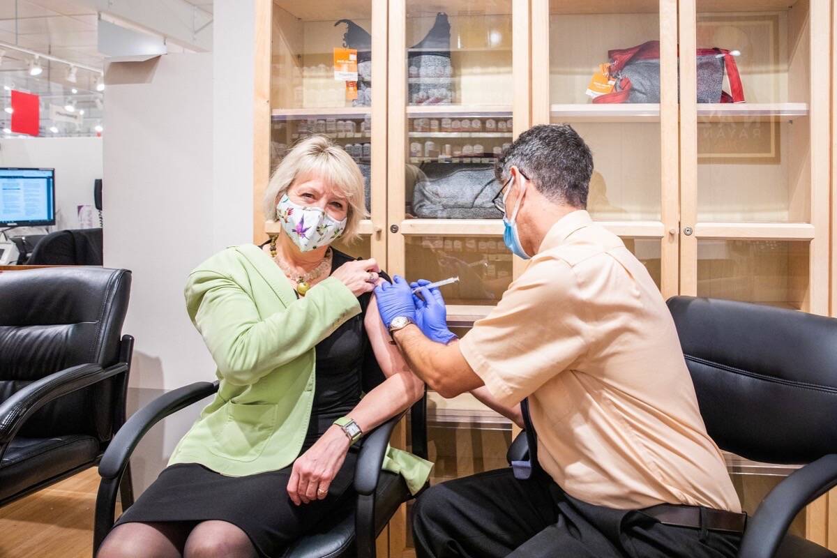 Provincial health officer Dr. Bonnie Henry has issued a statement about a new COVID-19 variant of concern, “Omicron.” Pictured here, Henry receiving a seasonal influenza vaccination in October. (B.C. government photo)