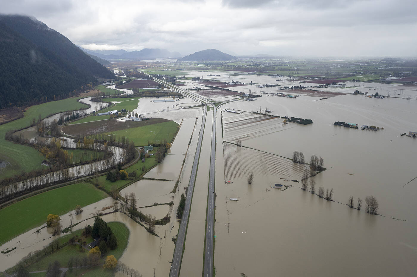 Highway 1 is pictured during a fly over the flood damage in Abbotsford, B.C., Tuesday, November 23, 2021. THE CANADIAN PRESS/Jonathan Hayward