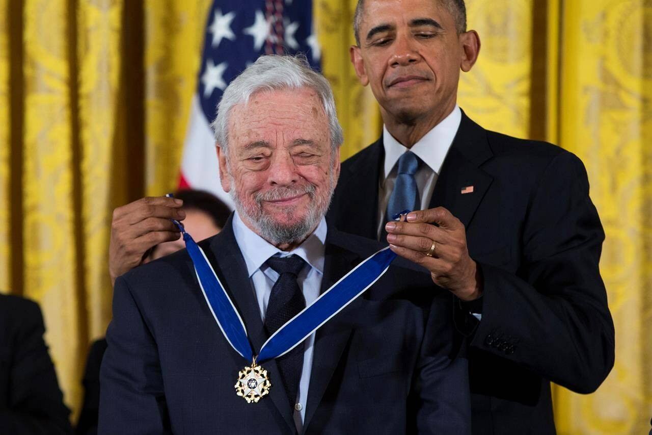 FILE - President Barack Obama, right, presents the Presidential Medal of Freedom to composer Stephen Sondheim during a ceremony in the East Room of the White House, on, Nov. 24, 2015, in Washington. Sondheim, the songwriter who reshaped the American musical theater in the second half of the 20th century, has died at age 91. Sondheim’s death was announced by his Texas-based attorney, Rick Pappas, who told The New York Times the composer died Friday, Nov. 26, 2021, at his home in Roxbury, Conn. Pappas did not return calls and messages to The Associated Press. (AP Photo/Evan Vucci, File)