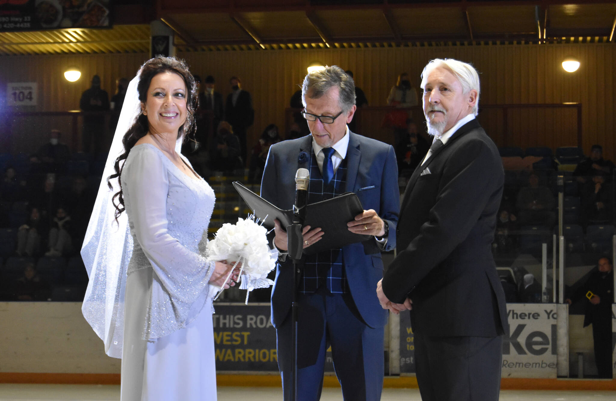 Radka Malyk and Jim Peck were married by West Kelowna Warrior’s Chaplain Don Richmond during the November 27 game. (Cole Schisler photo)