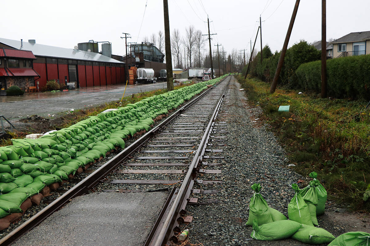Rail lines running parallel to the U.S. border are sandbagged in Abbotsford. Andy Holota / Black Press Media photo.