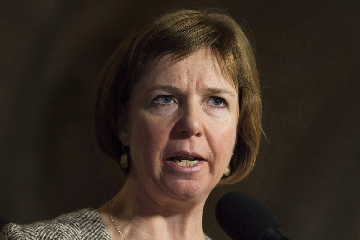 NDP MP Sheila Malcolmson speaks with the media about her private members bill regarding abandoned vessels, in Ottawa on Thursday, November 30, 2017. THE CANADIAN PRESS/Adrian Wyld
