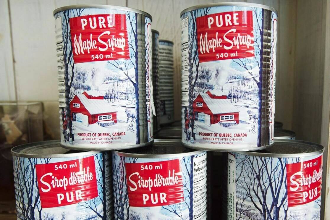 Maple syrup cans are seen at a sugar shack Friday, Feb. 10, 2017 in Oka, Que. THE CANADIAN PRESS/Ryan Remiorz