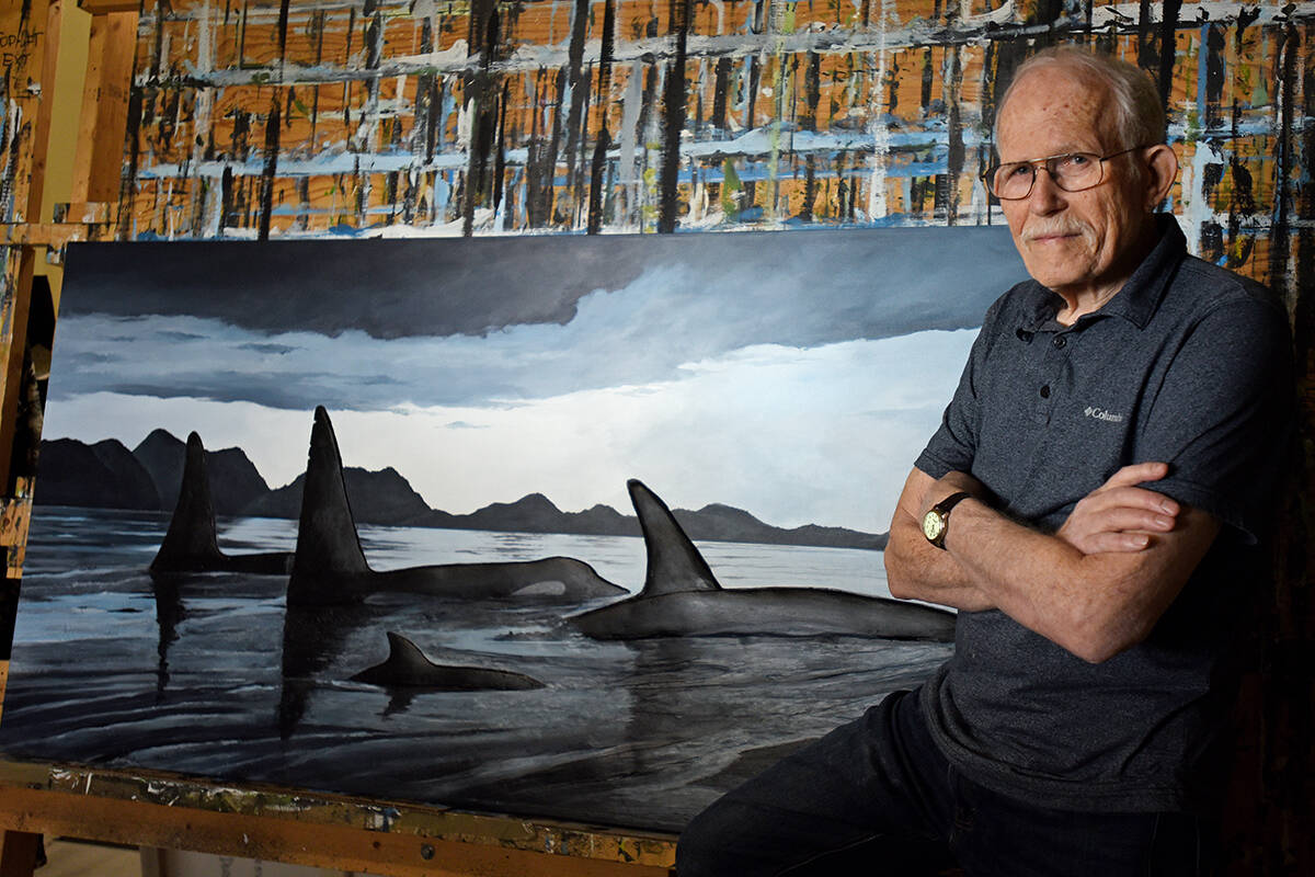 September 7, 2021 -Artist Karel Doruyter stands in front of a painting on his easel in his home studio in Nanaimo. Don Denton photograph