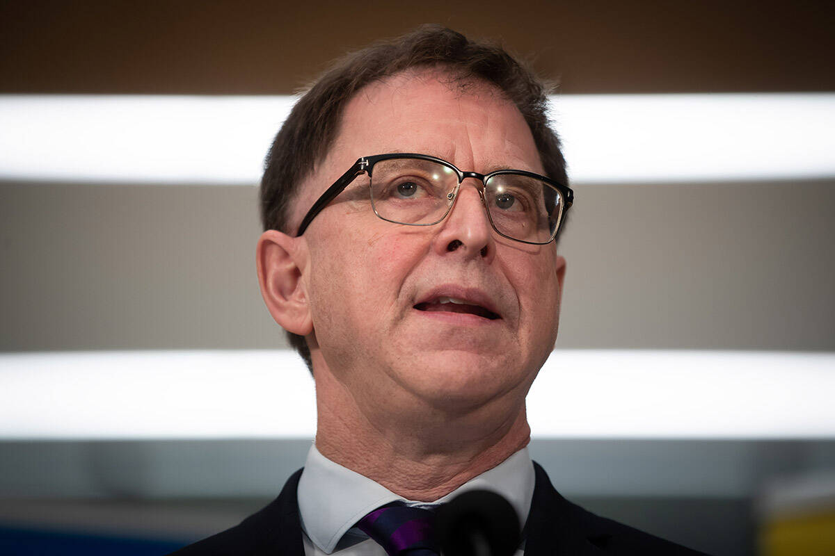 FILE – British Columbia Health Minister Adrian Dix speaks during the official opening of the Canadian Cancer Society Centre for Cancer Prevention and Support, in Vancouver, on Wednesday, November 10, 2021. THE CANADIAN PRESS/Darryl Dyck