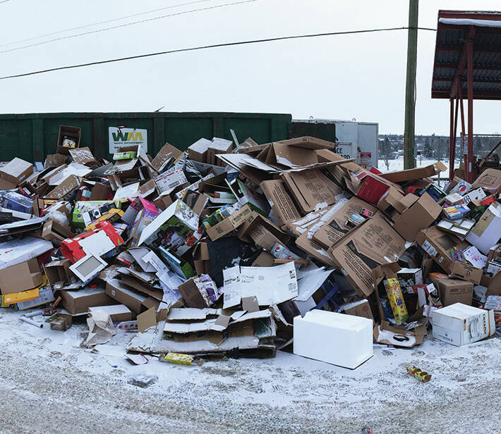Now that's a lot of cardboard: Over the Christmas long weekend two extra large bins weren't enough to contain all the cardboard from presents and holiday gifts Ponoka and area residents. On the Monday, Dec. 28 this panorama photo shows the downtown recycle depot was full of cardboard to be recycled.
Photo by Jeffrey Heyden-Kaye