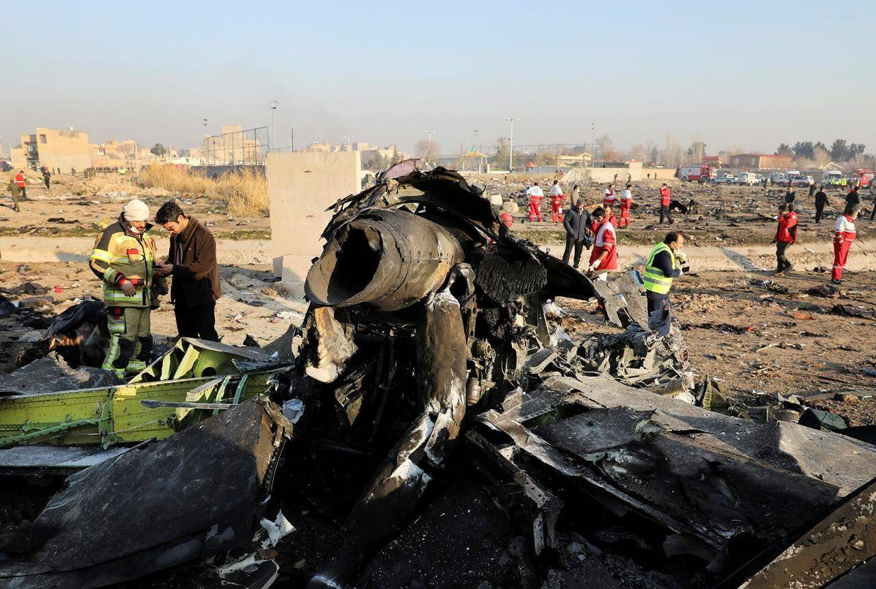 Debris at the scene where a Ukrainian plane crashed in Shahedshahr, southwest of the capital Tehran, Iran, Jan. 8, 2020. Canada and its allies are being urged to aggressively reach into the Iranian government’s pocket and seize assets to compensate for the regime’s downing of Ukraine International Airlines Flight 752 two years ago.
THE CANADIAN PRESS/AP-Ebrahim Noroozi