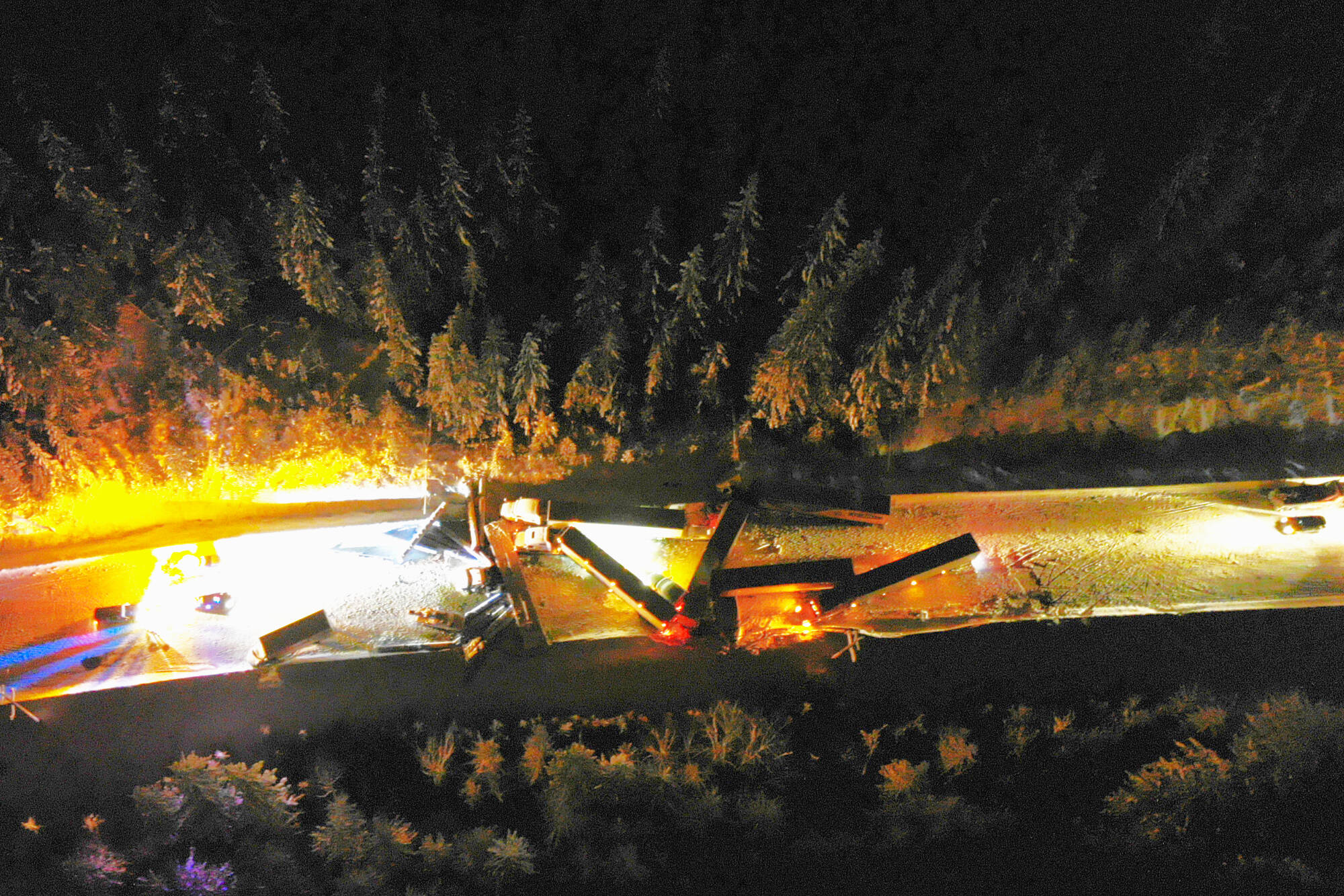 Several commercial tractor trailer units can be seen in this RCMP drone image of the Saturday, Jan. 8 collision on Highway 1 between Sicamous and Salmon Arm. Police are seeking more information about the incident that resulted in the death of one person and sent six others to hospital. (RCMP photo)