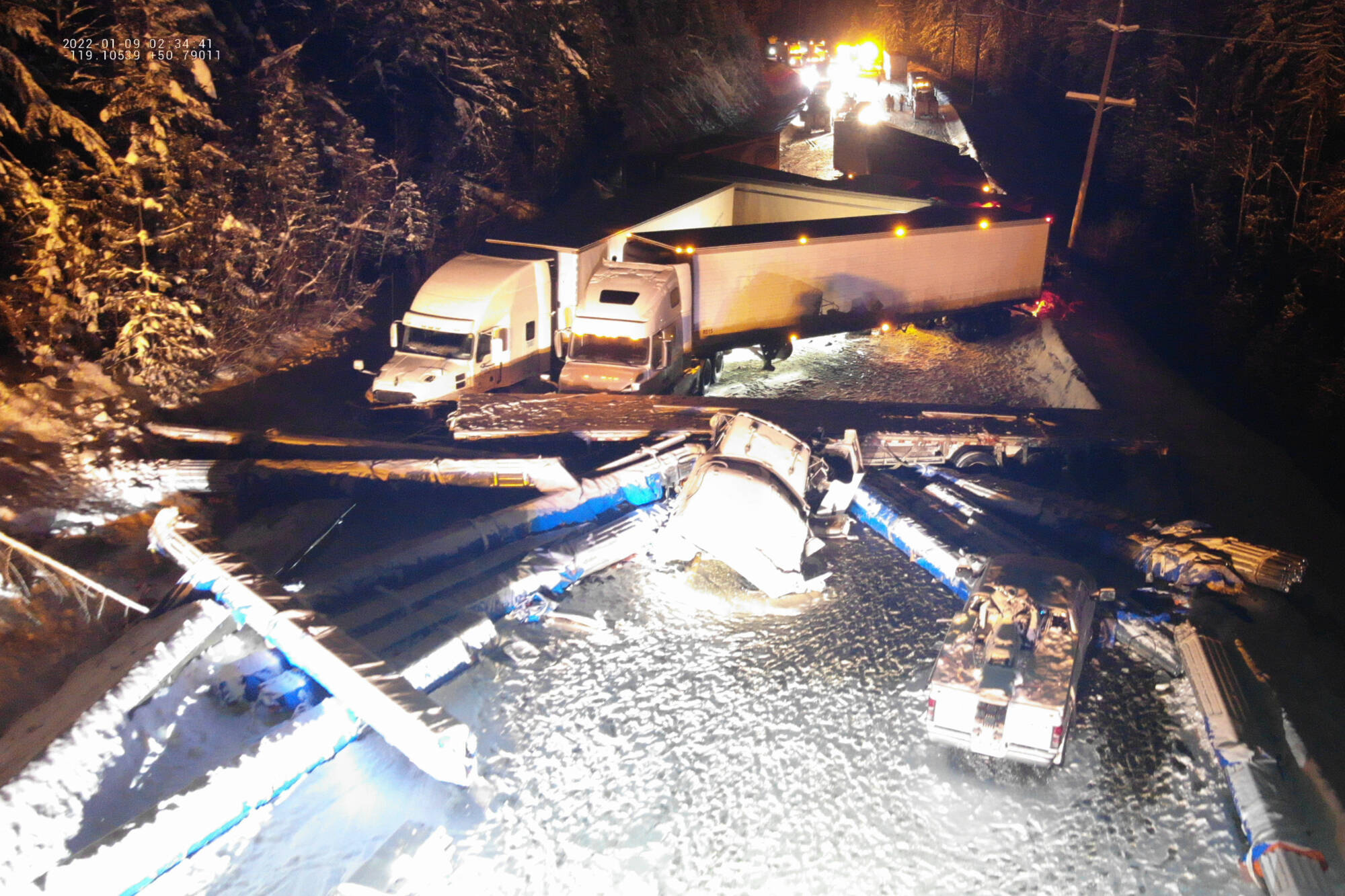 Several commercial tractor trailer units can be seen in this RCMP drone image of the Saturday, Jan. 8, collision on Highway 1 between Sicamous and Salmon Arm. Police are seeking more information about the incident that resulted in the death of one person and sent six others to hospital. (RCMP photo)