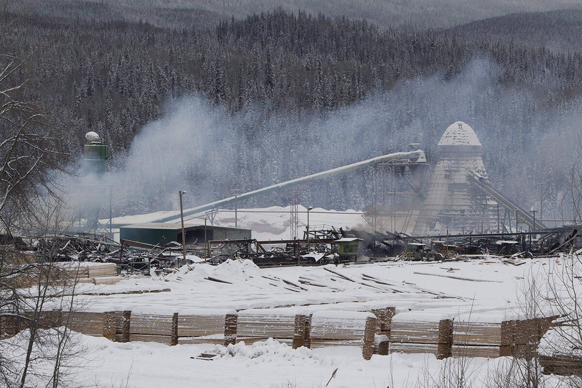 FILE – Smoke rises from the Babine Forest Products mill in Burns Lake, B.C. Sunday, Jan. 22, 2012. THE CANADIAN PRESS/Jonathan Hayward