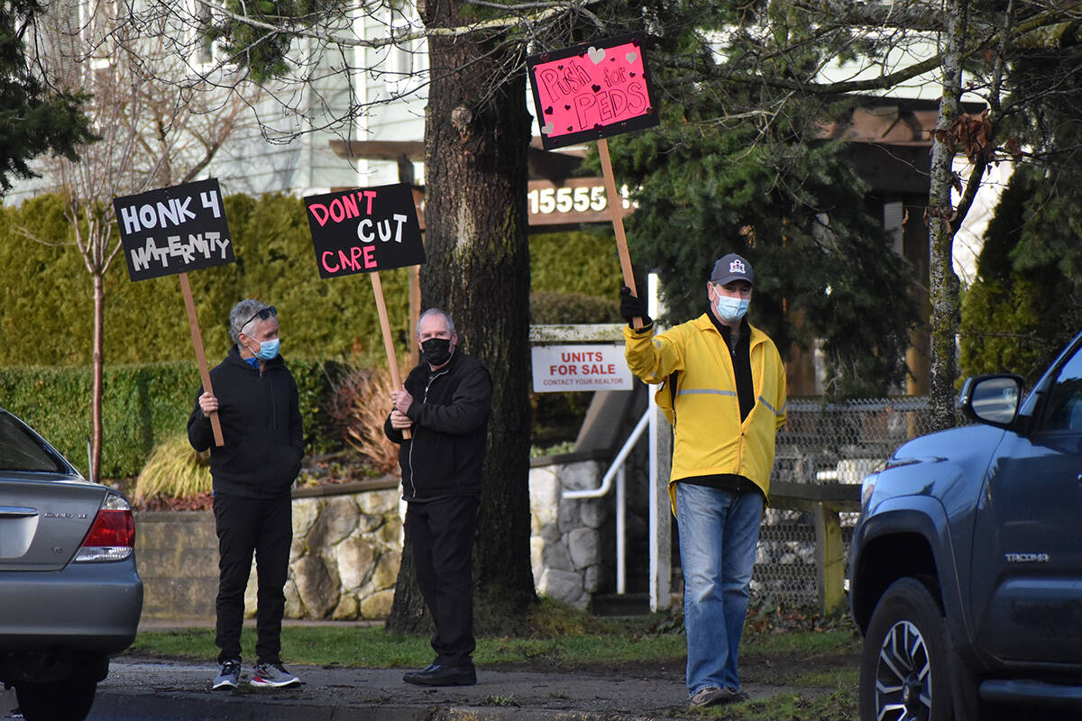 A protest of about 75 people gathered at Peace Arch Hospital Thursday to show the community’s frustration with a Fraser Health decision to temporarily close the maternity ward. The decision was reversed later Thursday. (Aaron Hinks photo)