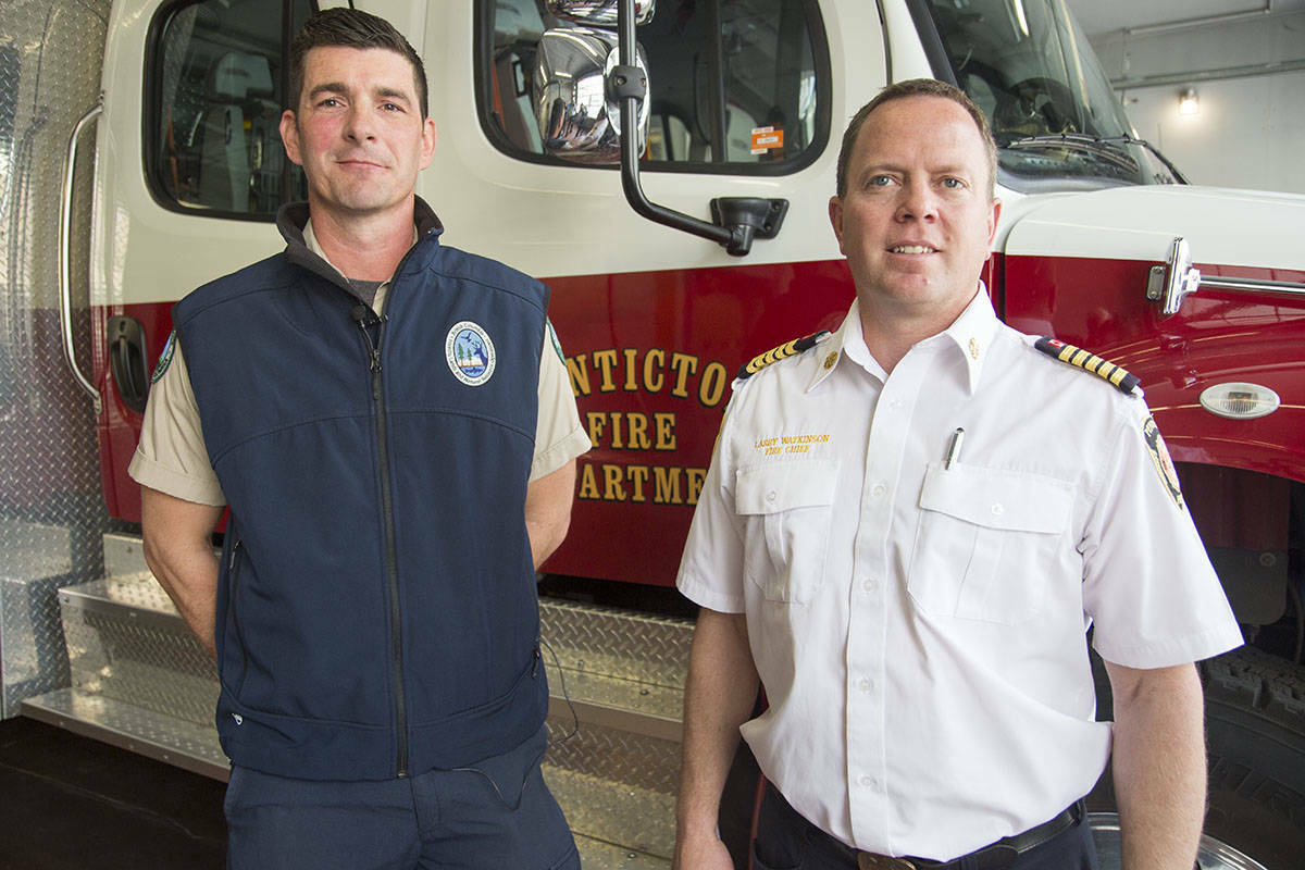 From left, Jonathan Finlay, a wildfire technician with B.C. Wildfire Service, and Penticton fire chief Larry Watkinson organized the Wildland Urban Interface Wildfire Training Symposium in 2019. (Penticton Western News file photo)