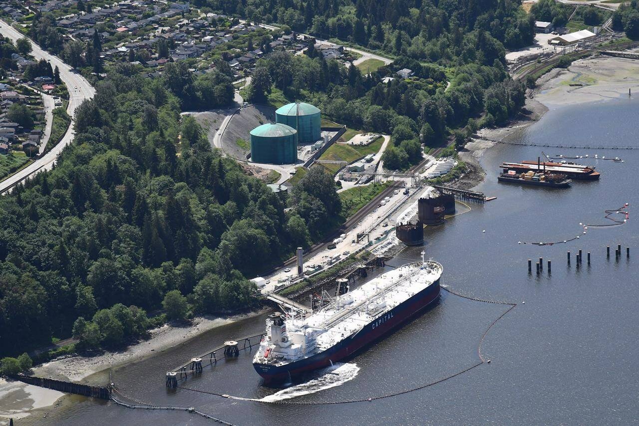 An aerial view of the Trans Mountain marine terminal in Burnaby, B.C., is shown on Tuesday, May 29, 2018. British Columbia has amended the conditions of its environmental assessment certificate for the Trans Mountain pipeline expansion and told the federal government it still has concerns about its response to potential marine oil spills. THE CANADIAN PRESS Jonathan Hayward