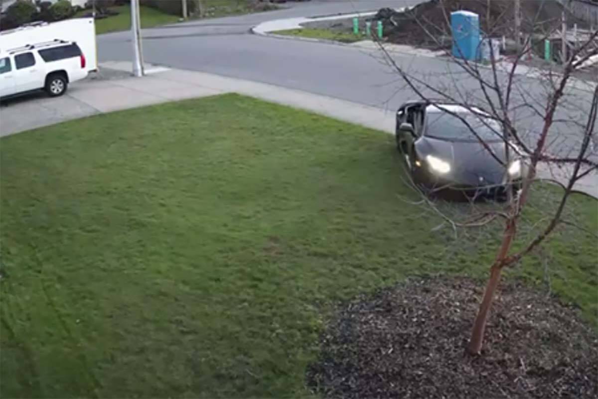 Video footage captured a driver speeding around a corner and crossing over a sidewalk into a front yard on Saturday (March 19) in west Abbotsford. (Screenshot from video)