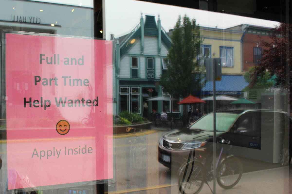 A help wanted sign in the window of a Revelstoke business during the summer of 2021. Canada’s unemployment rate has now reached a record low. (Tim van der Krogt-Revelstoke Review)