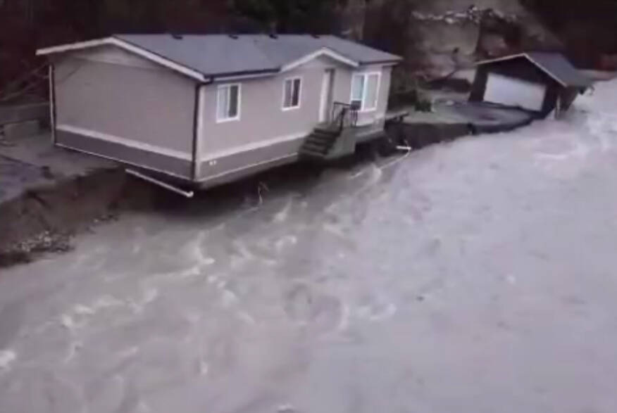 A home on Othello Road near Hope about to fall into the Coquihalla River, November 2021. (Facebook/Sarah Giraud)