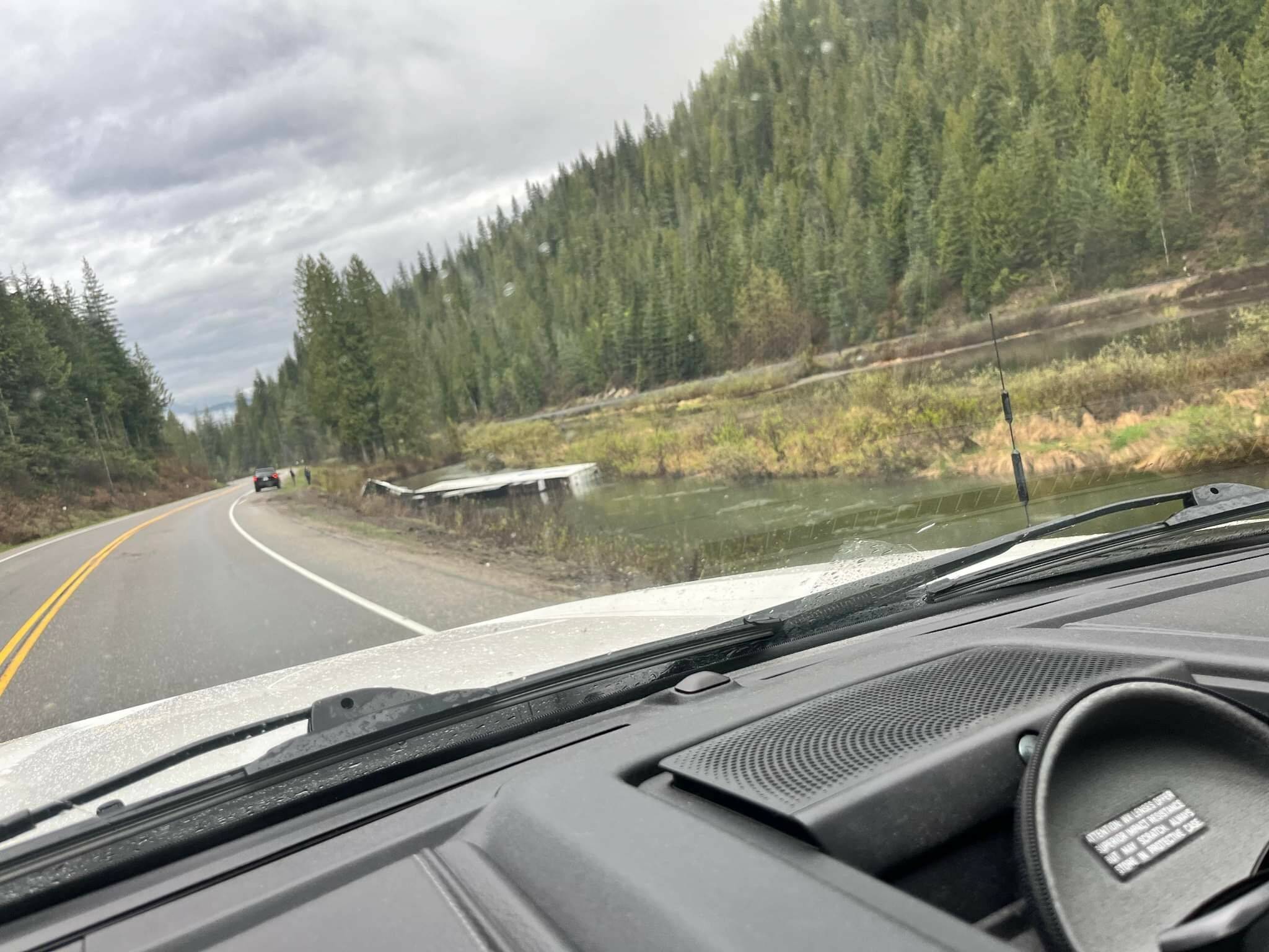 A Gold Freight semi-truck careened into a swamp on Highway 1 near Revelstoke on May 5. (Skilled Truckers Canada Facebook)