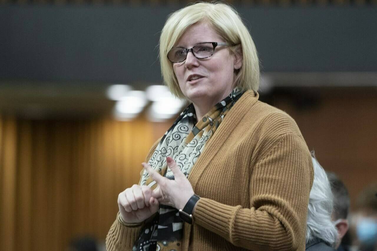 Employment Minister Carla Qualtrough rises during question period, Monday, April 4, 2022, in Ottawa. The federal government has announced nearly $247 million to help create more than 25,000 new apprenticeship positions across Canada. THE CANADIAN PRESS/Adrian Wyld