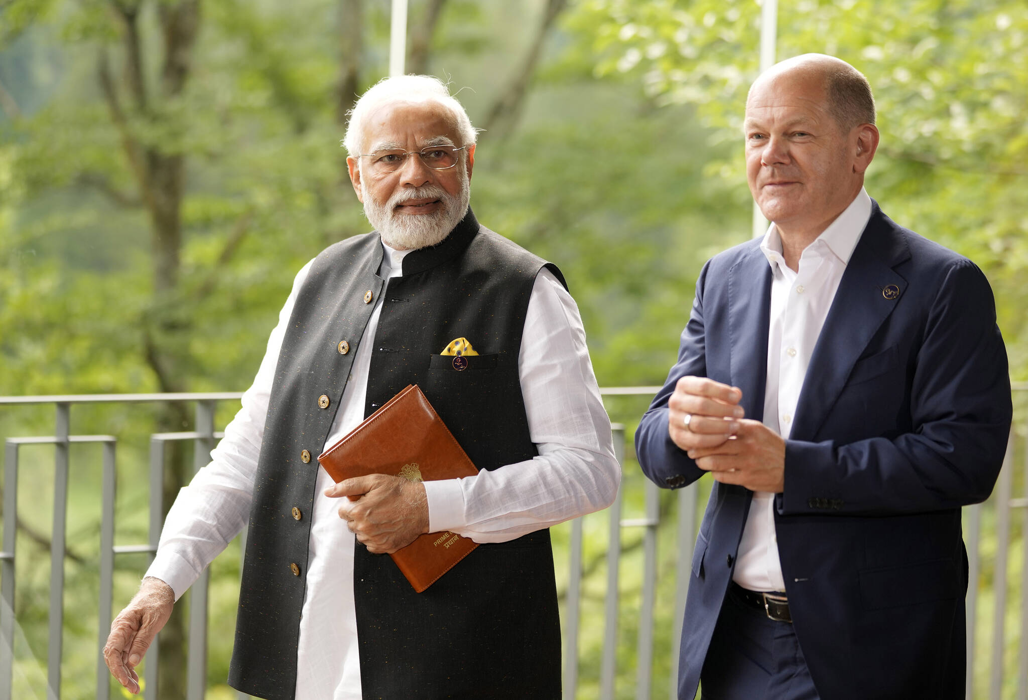 German Chancellor Olaf Scholz, right, walks with India’s Prime Minister Narendra Modi prior to a meeting on the sidelines of the G7 summit at Castle Elmau in Kruen, near Garmisch-Partenkirchen, Germany, on Monday, June 27, 2022. The Group of Seven leading economic powers are meeting in Germany for their annual gathering Sunday through Tuesday. (AP Photo/Markus Schreiber, Pool)