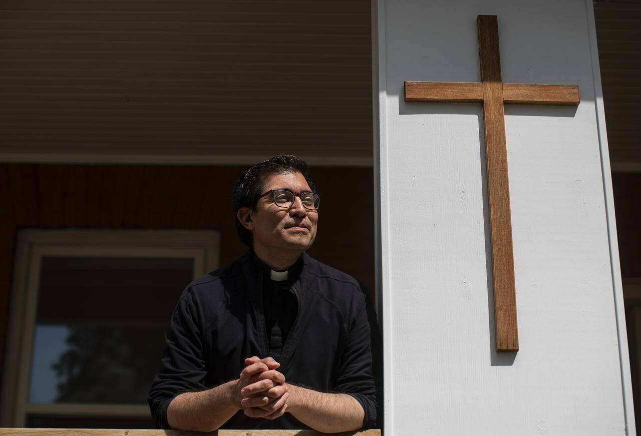 Rev. Cristino Bouvette pictured in Edmonton, Thursday, June 30, 2022. The priest of mixed Italian, Metis and Cree heritage is the national liturgical director for the papal visit from July 24 to 29. THE CANADIAN PRESS/Jason Franson