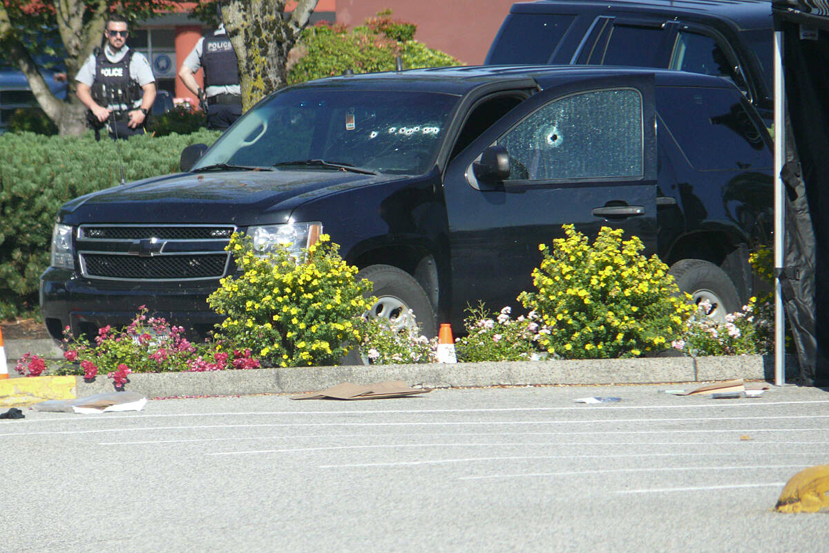 An SUV near 200th Street and the Langley Bypass was riddled with bullet holes in the shooting incident Monday morning. (Dan Ferguson/Langley Advance Times)
