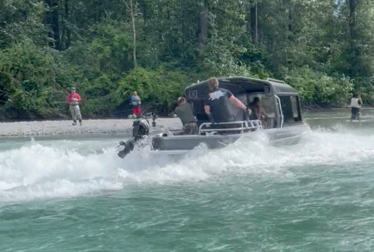 Still from a video as a jet boat stopped after speeding on the Vedder River on July 24, 2022. Three men then got out and seriously assaulted an angler on shore. (Anonymous submitted)