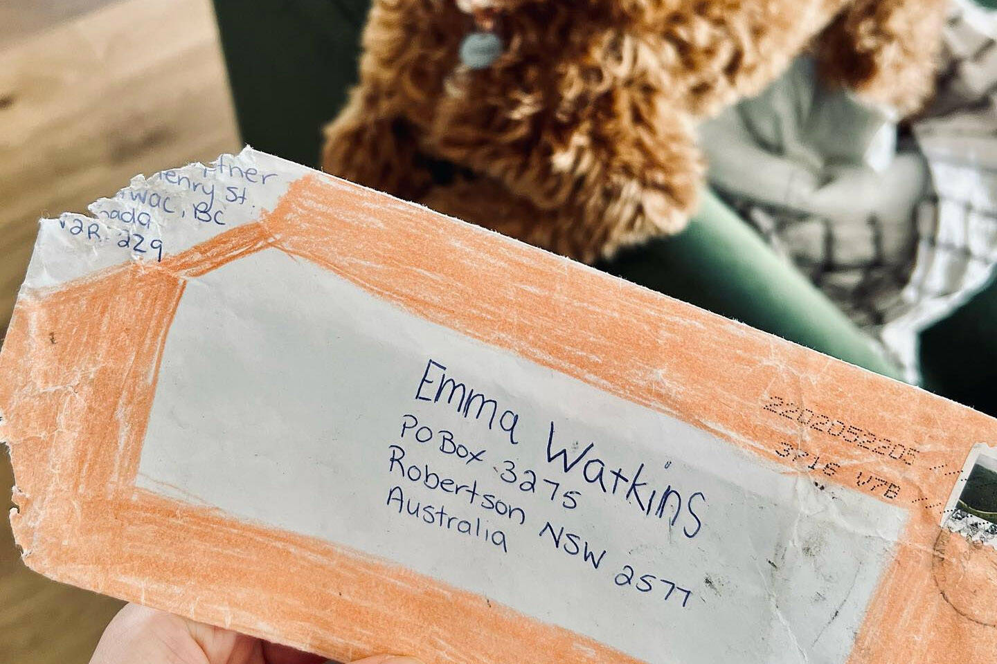 A well-known Australian children’s singer is hoping to get in touch with a fan from Chilliwack who sent her some artwork. The envelope with the return address was damaged by her dog Patch. (Emma Watkins/ Facebook)
