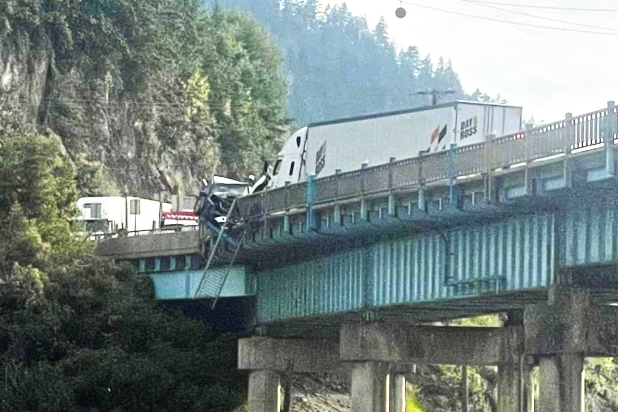 Highway 1 was closed in both directions following a multiple-vehicle collision on the Bruhn Bridge at Sicamous on Thursday evening, July 28, 2022. (Contributed)