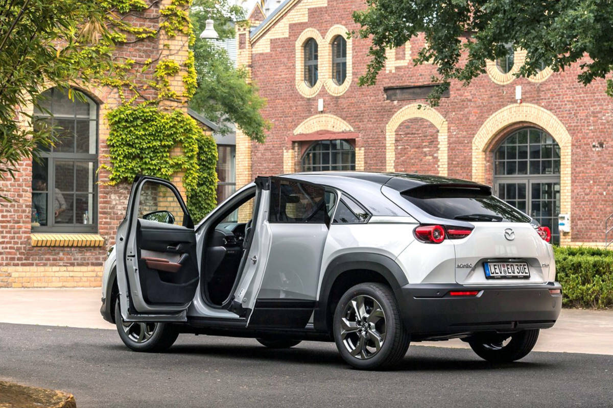 The MX-30 uses the bones of the CX-30 utility vehicle, but the MX-30’s rear doors are hinged at the back and of course the styling is different with a big front bumper and thin grille. PHOTO: MAZDA