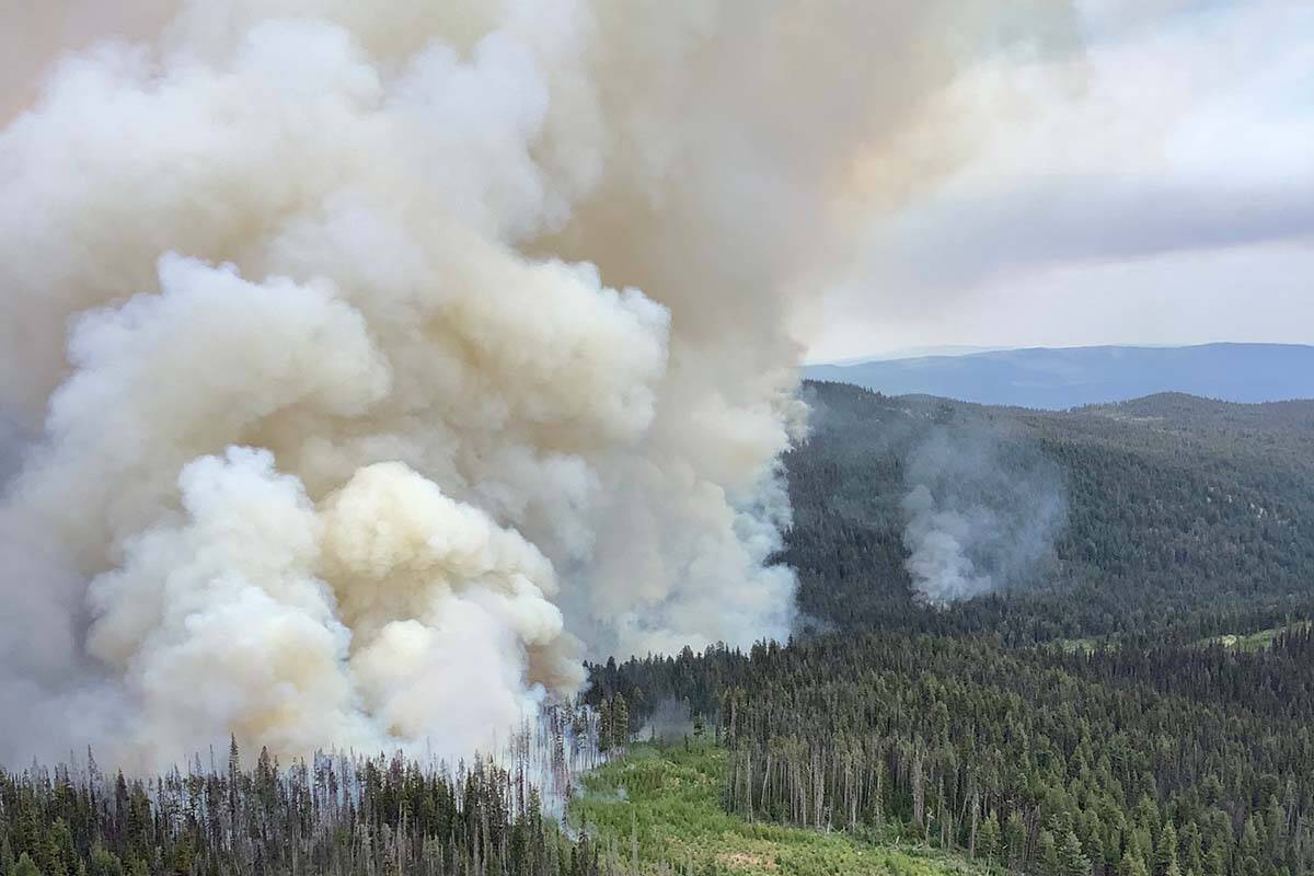 A BC Wildfire Service photo shows fire activity at Maria Creek near Pavilion on Aug. 2. The service says wildfire activity will continue throughout August. (Courtesy of BC Wildfire Service)