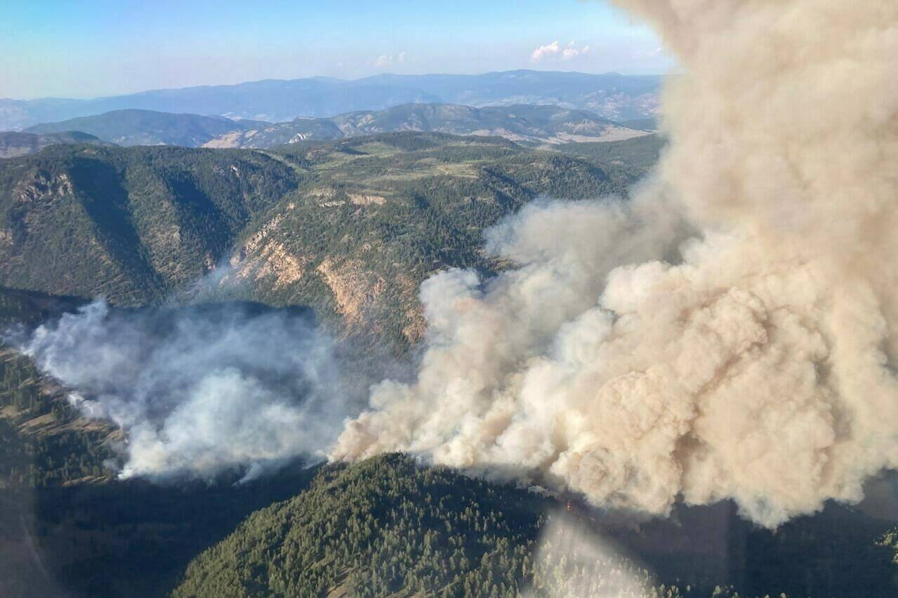 An aerial view of the Keremeos Creek wildfire is shown in a July 29, 2022 handout photo. Hot weather and dry conditions are the usual suspects in any wildfire season, but experts say a complex interplay of topography and unpredictable winds can create particularly challenging adversaries for firefighters. THE CANADIAN PRESS/HO-BC Wildfire Service