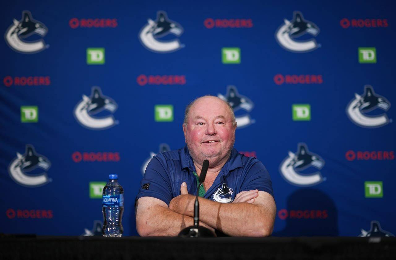 Vancouver Canucks head coach Bruce Boudreau responds to questions during a news conference ahead of the NHL hockey team’s training camp, in Vancouver, B.C., Wednesday, Sept. 21, 2022. After a too-long summer, the Vancouver Canucks are locked on a singular goal as they prepare for training camp: playoffs. THE CANADIAN PRESS/Darryl Dyck