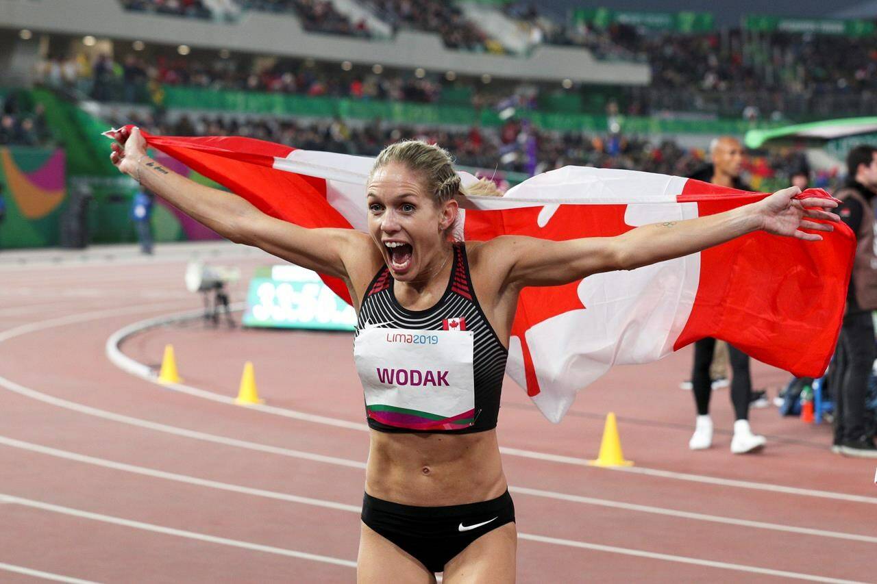 Natasha Wodak of Canada celebrates winning the gold medal in the women’s 10000m final during the athletics at the Pan American Games in Lima, Peru, Tuesday, Aug. 6, 2019. The 40-year-old from North Vancouver, B.C., who grew to love training for the marathon, shattered the Canadian record in that distance in Berlin on Sunday. THE CANADIAN PRESS/AP-Martin Mejia