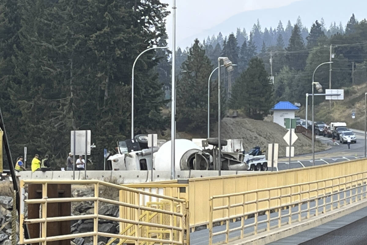 A cement truck crashed and flipped on its side at the Kootenay Bay Ferry Terminal on Sept. 13. (Photo submitted)