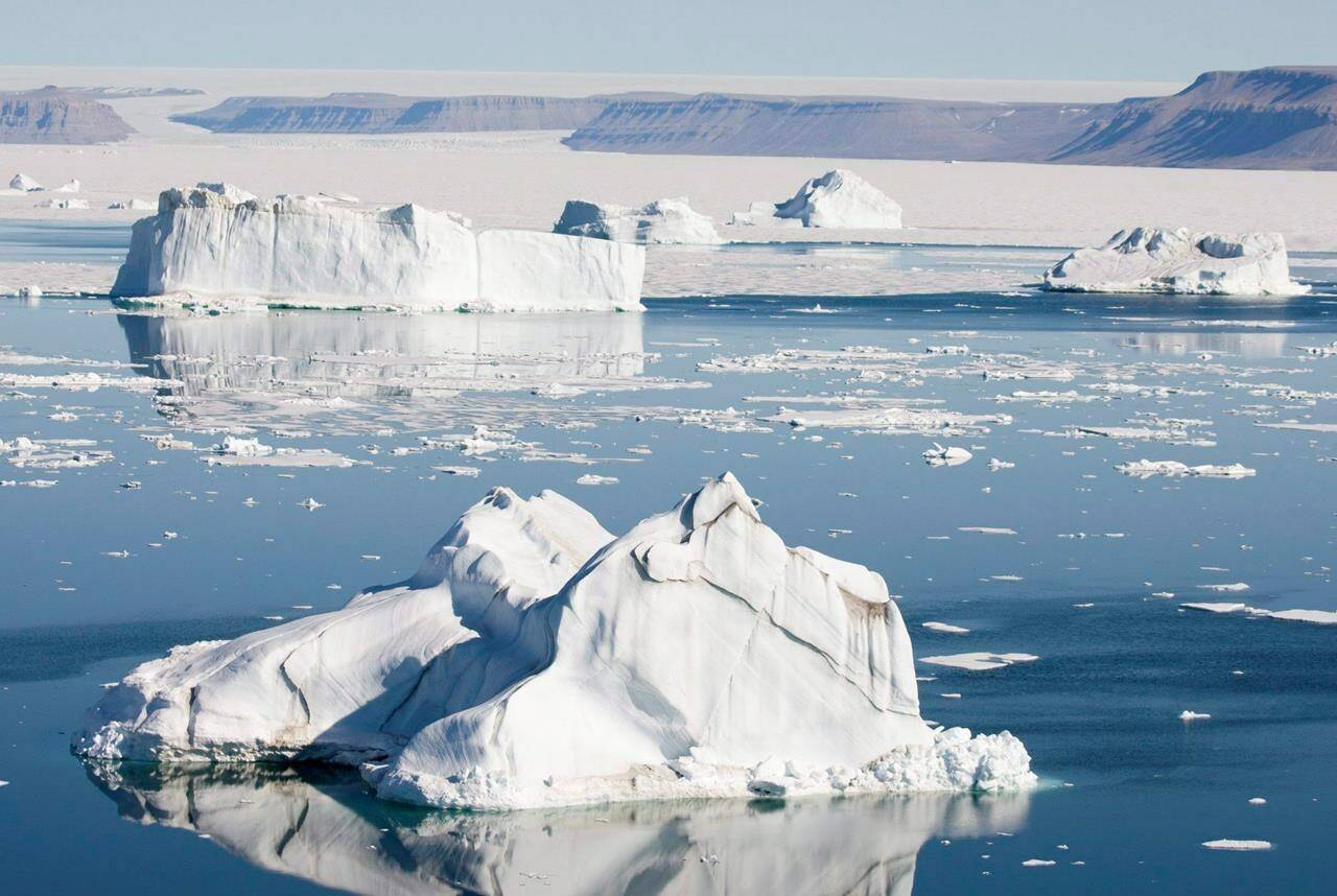 Icebergs are seen from outside Croaker Bay on Devon Island, Canada, on Friday, July 11, 2008. THE CANADIAN PRESS/Jonathan Hayward